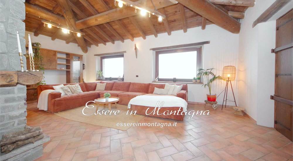 Il soggiorno open sulla cucina